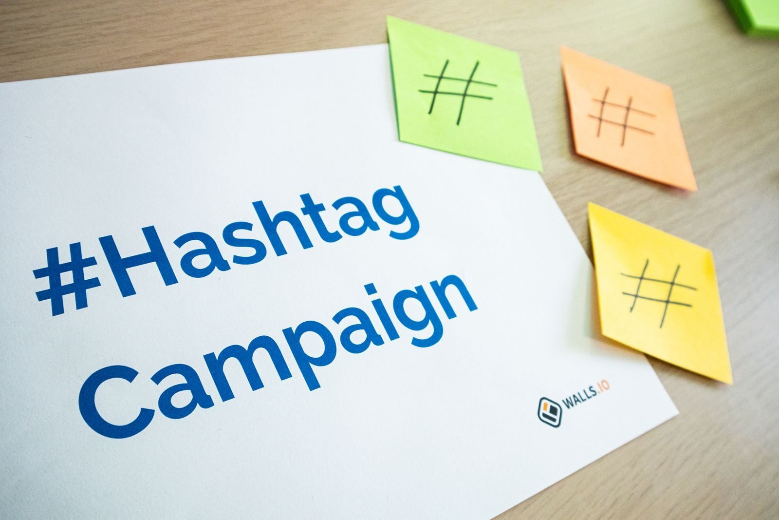 Entrepreneur researching relevant hashtags for a social media post