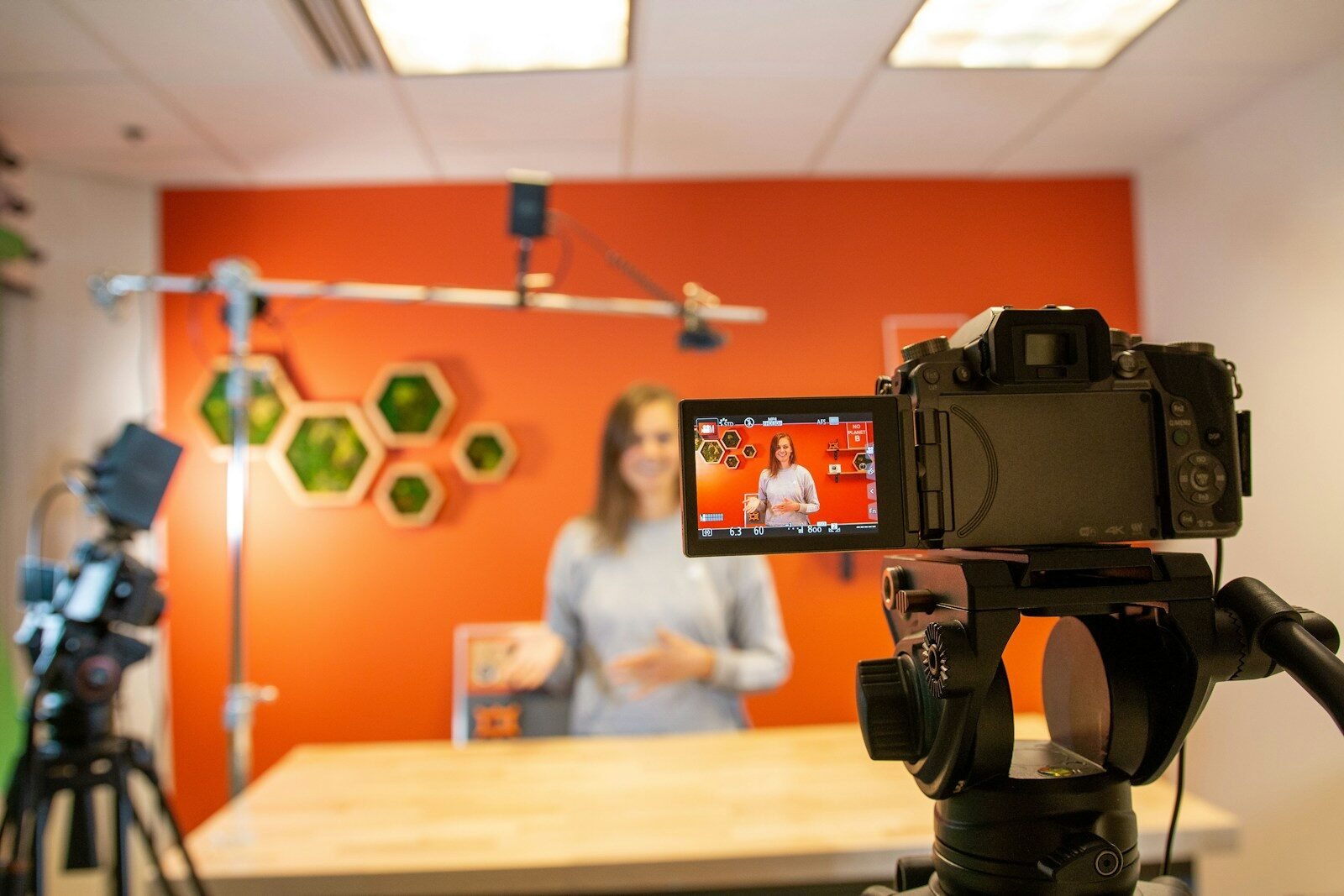 Entrepreneur recording a marketing video for their business on a smartphone