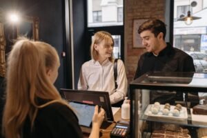 Business owner mapping out buyer persona details on a whiteboard