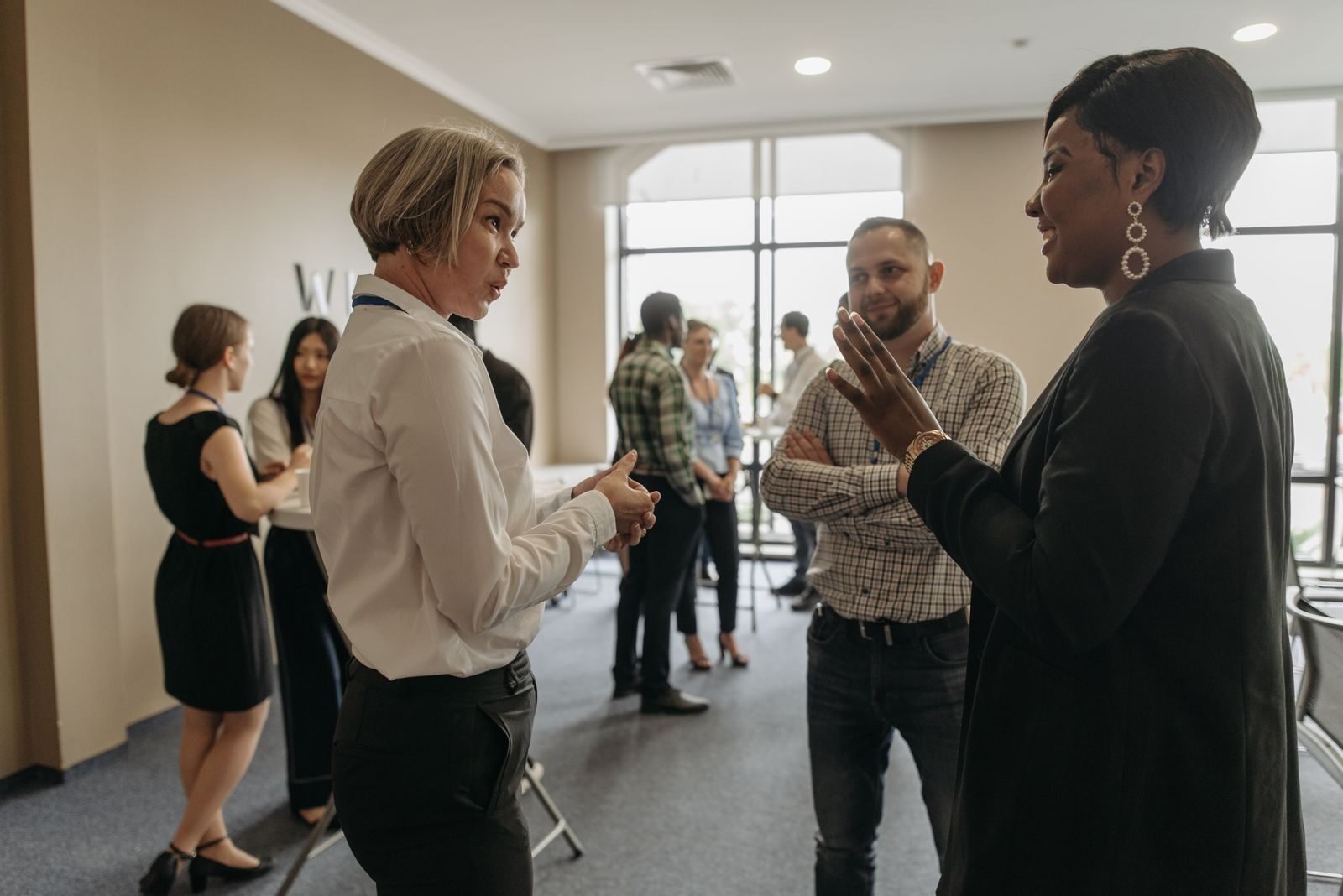 Entrepreneur networking and connecting with others at a local business event.
