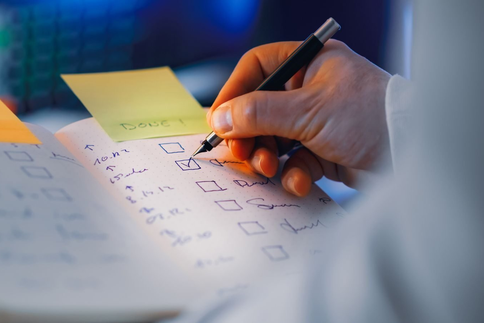 Business owner reviewing an online presence checklist on a laptop