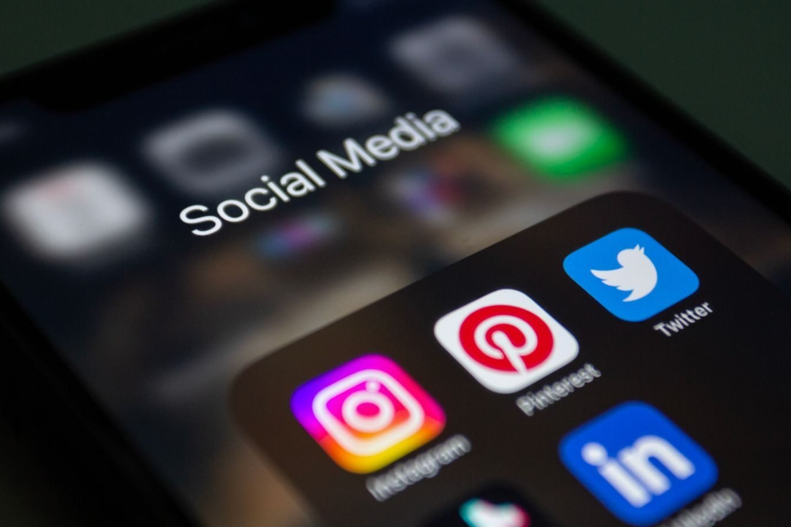 Entrepreneur planning how often to post on social media using a content calendar