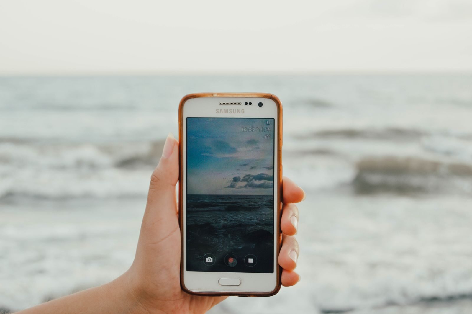 Smartphone displaying vertical video content in portrait orientation