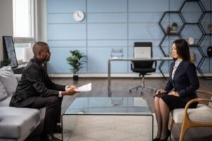 Entrepreneur conducting a video interview with a satisfied client