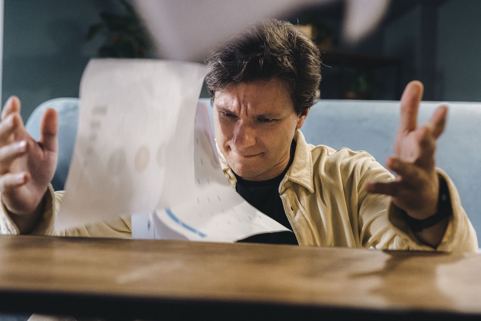 Business owner mapping out client problems and perspectives on a whiteboard