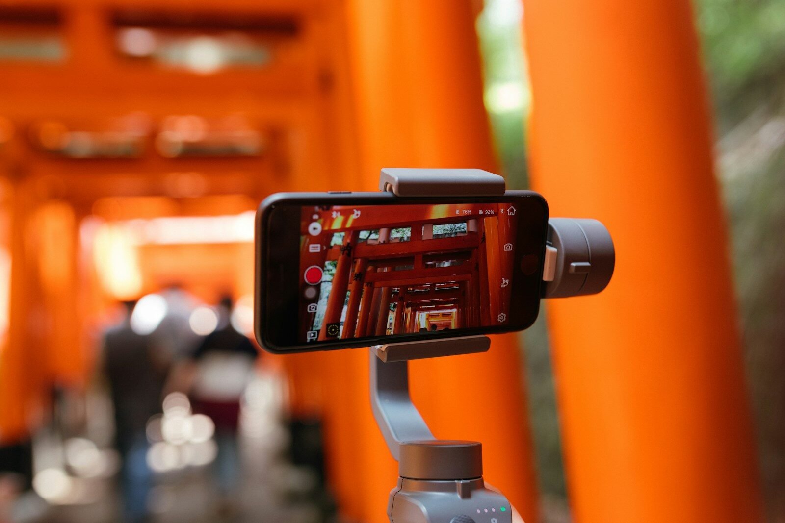 Entrepreneur recording professional-looking video content with just a smartphone